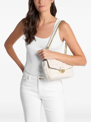 Michael Kors Soho Large Quilted Shoulder Bag in a light cream color