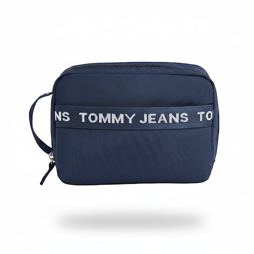 Navy blue pouch with Tommy Jeans logo on a white background
