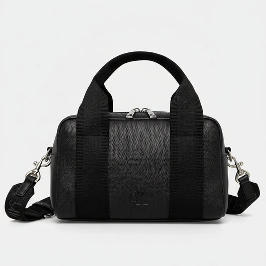 Calvin Klein Jeans Ultralight Barrel Bag in black faux leather