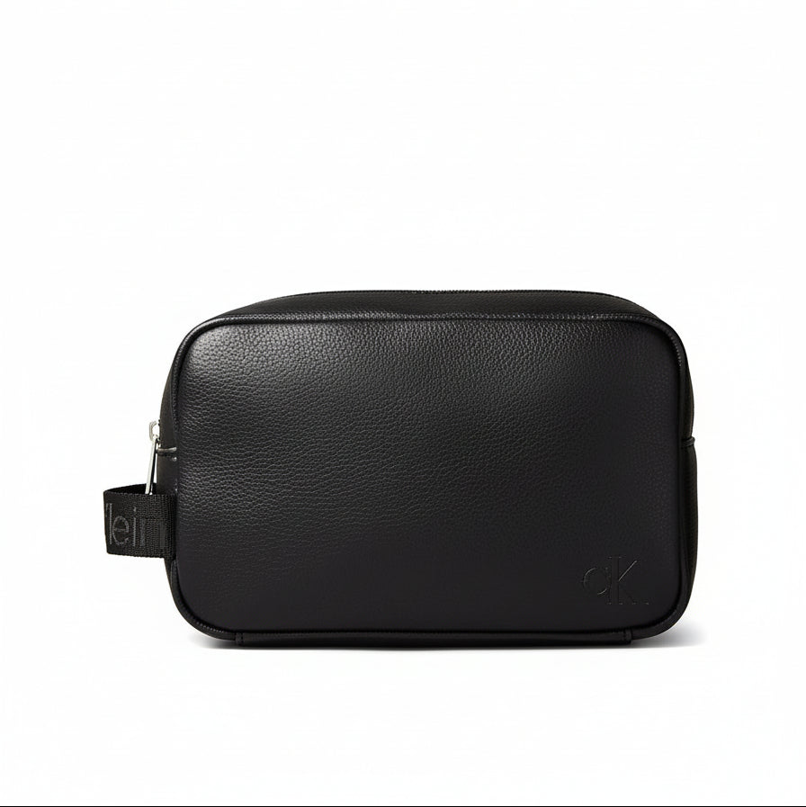 Calvin Klein Cargo Dopp Kit in black faux leather