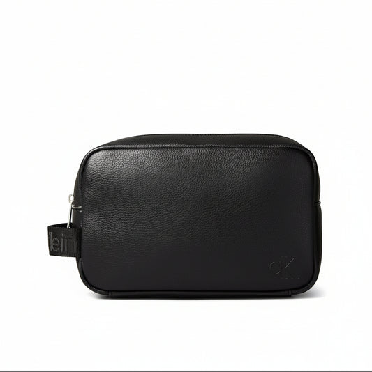 Calvin Klein Cargo Dopp Kit in black faux leather