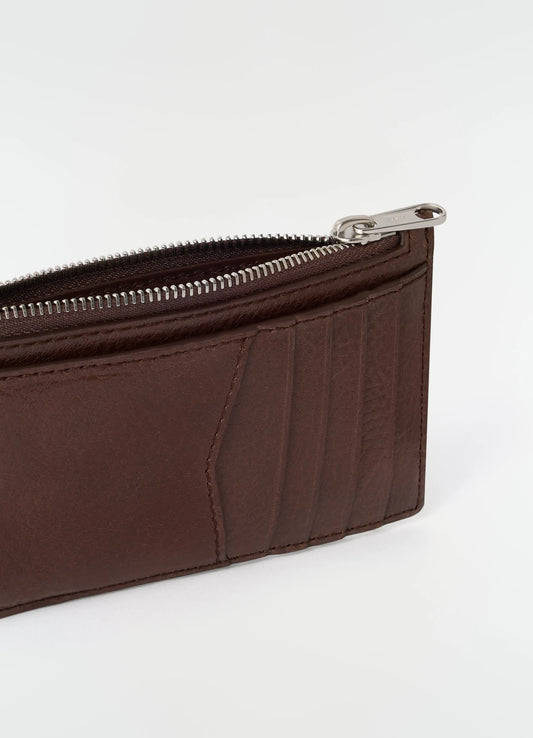 Calvin Klein Allover Emblem Logo Top Zip Card Case in the color Fudge