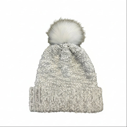 Calvin Klein Women's Faux Fur Pom Knit Beanie in a white and silver color scheme