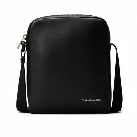 Calvin Klein Jeans Ultralight Reporter shoulder bag in black polyurethane