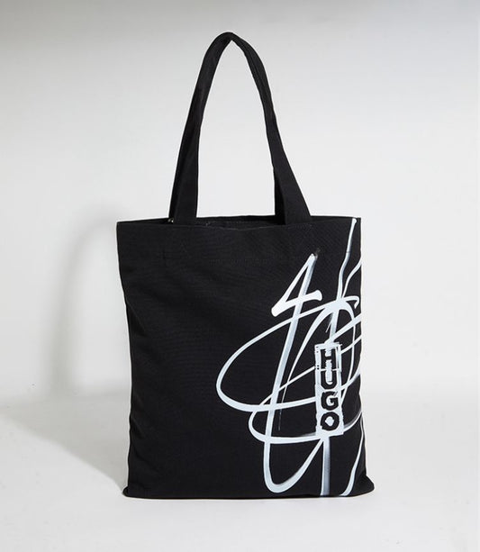 Hugo Tote bag in black with a white graphic print