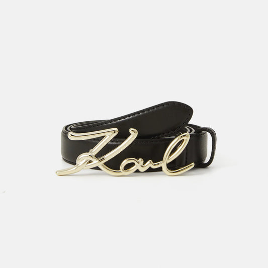Black belt with gold 'Karl' buckle on a white background