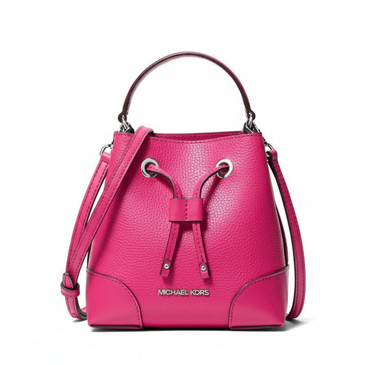 Pink handbag with drawstring closure on a white background