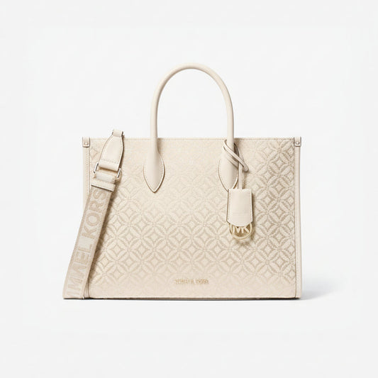 Michael Kors Mirella medium metallic logo jacquard tote bag in a naturalcream color with silver-tone hardware