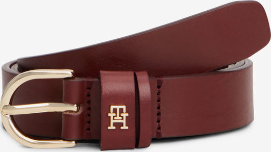 Tommy Hilfiger monogram buckle leather belt in a burgundy color with a gold tone TH monogram buckle