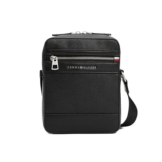 Tommy Hilfiger Central Mini Reporter bag in black faux leather with a pebble grained finish