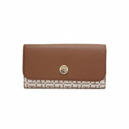 Brown wallet with patterned flap on a white background